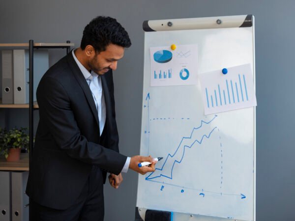 business-person-looking-finance-graphs