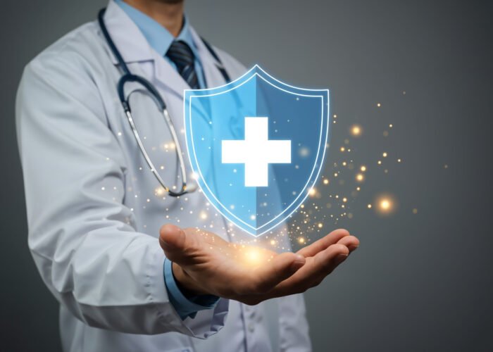 doctors-hand-holding-health-insurance-shield-medical-care-concept